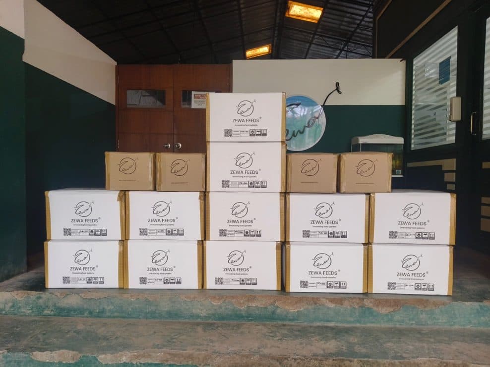 Stacked Zewa Feeds cartons ready for dispatch